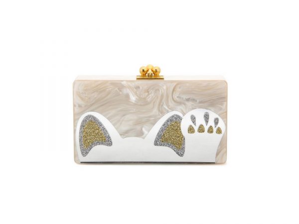 La clutch di Edie Parker è preziosa e divertente grazie al profilo di un micio che spunta.